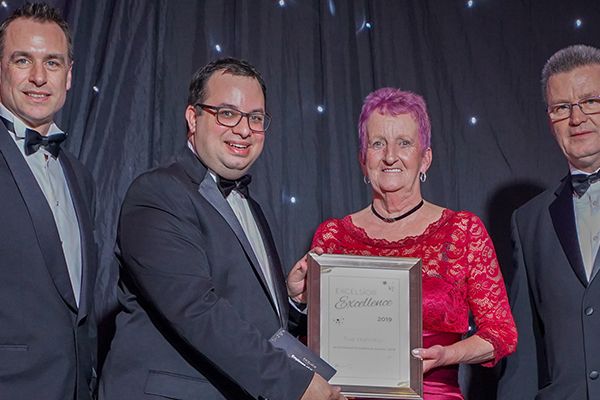 Photo of Sue Hamilton, Excelsior Coaches employee of the year, with the Go South Coast director team